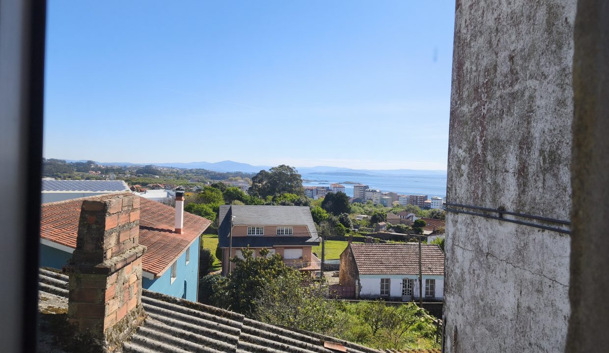 Casa en Ribeira con parcela y vistas despejadas