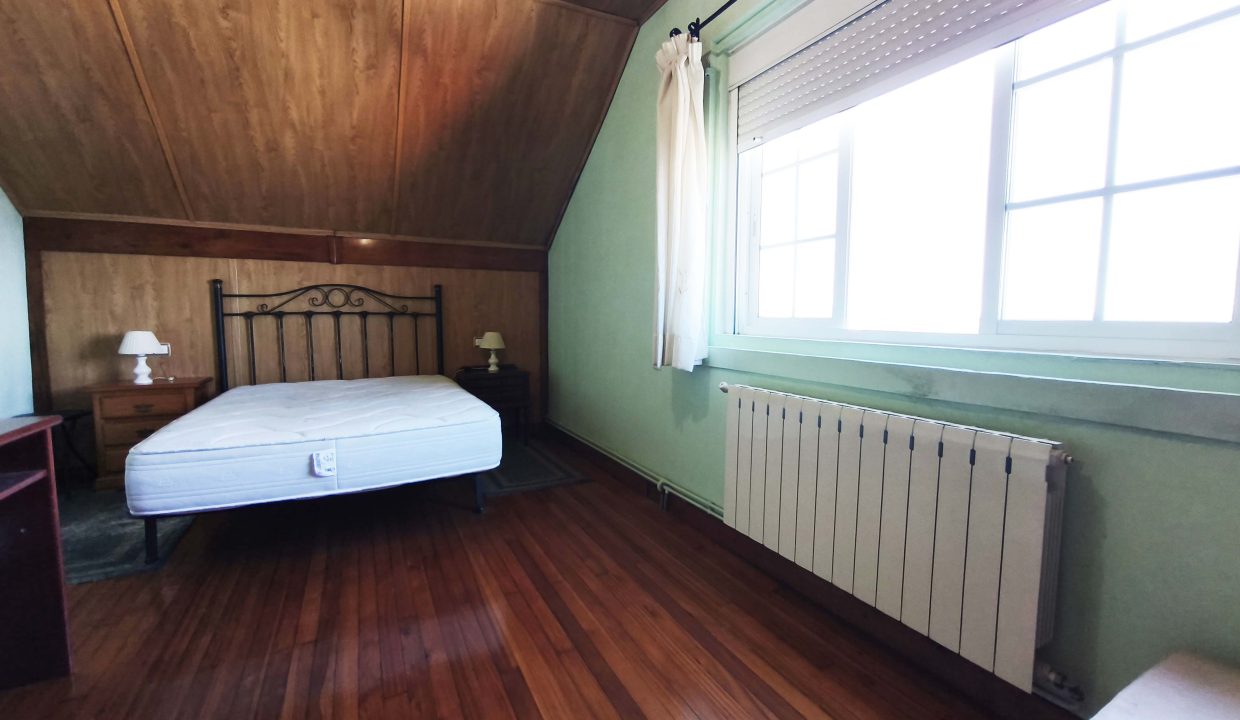 Dormitorio con vistas
